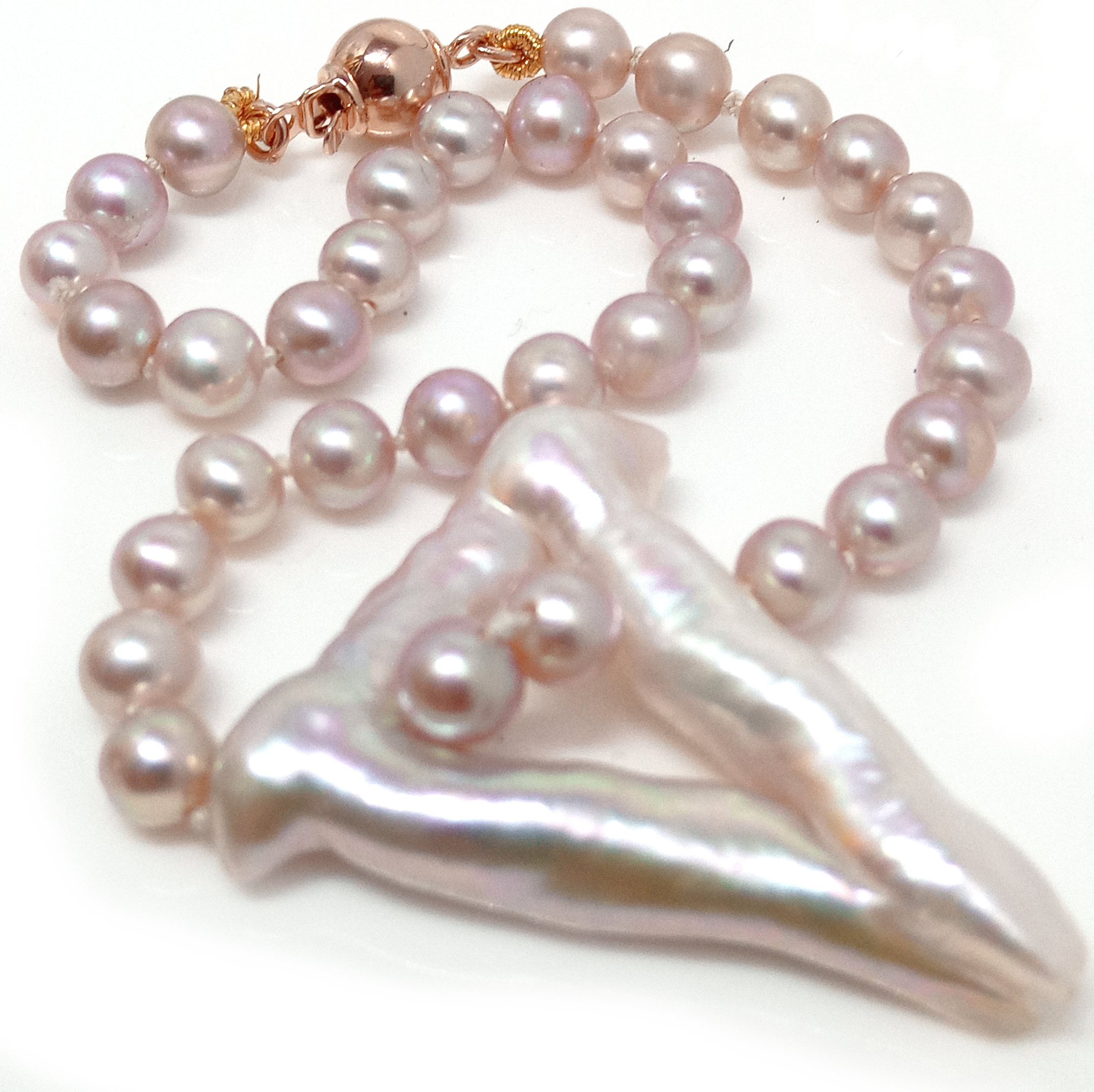 Natural Peach Pearls with a Special Triangle Pearl Bracelet